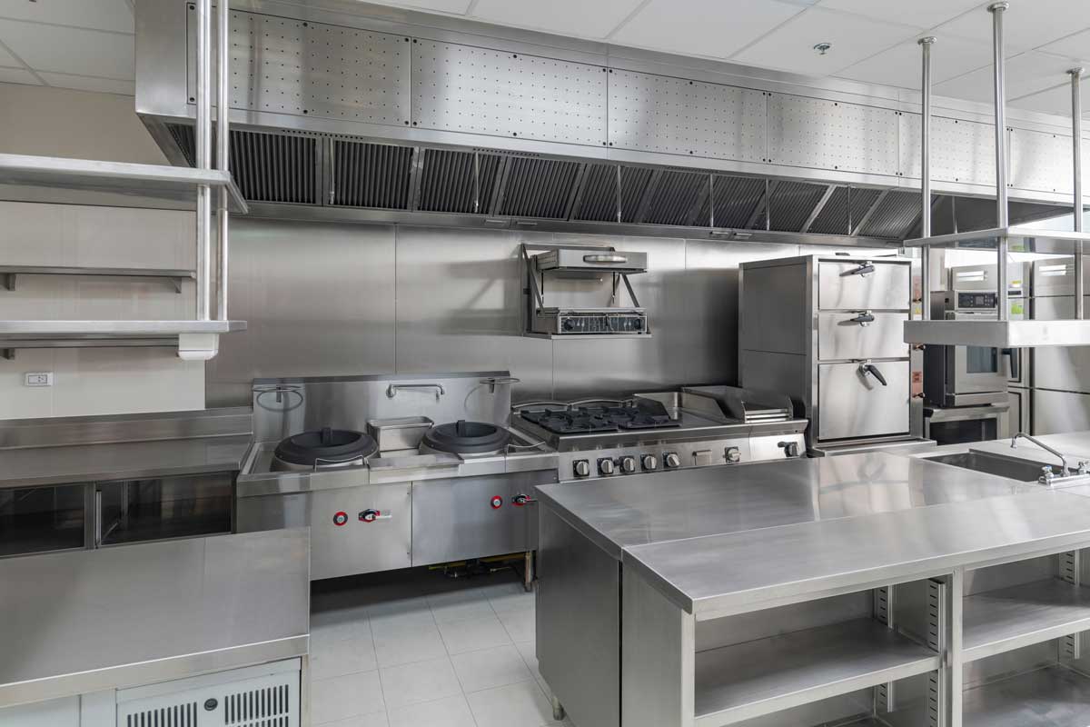 Stainless steel appliances in a commercial restaurant kitchen